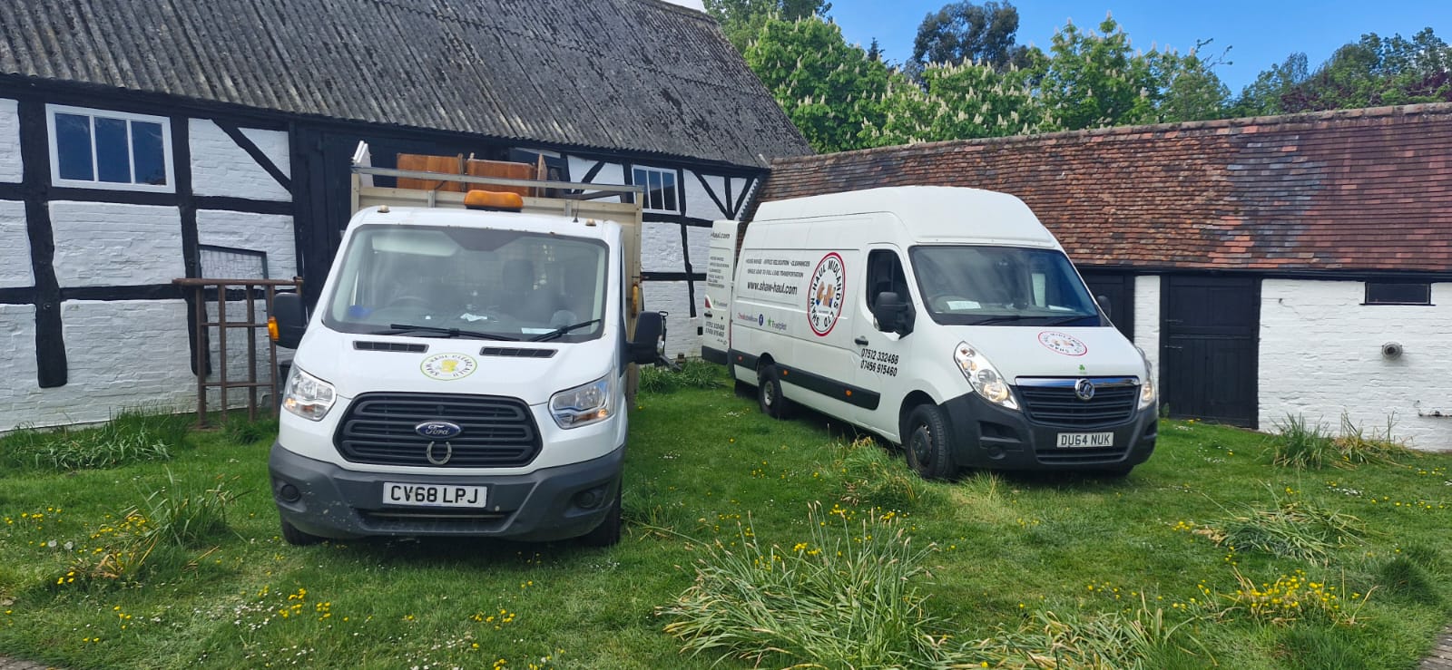 Clearz All tipper and Shaw Haul Midlands van beside a timber-framed barn