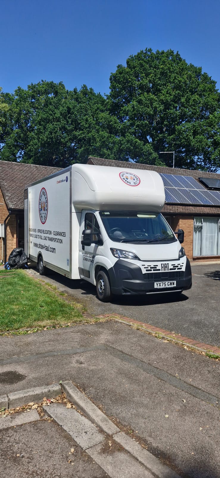 Shaw Haul Luton on a bungalow driveway