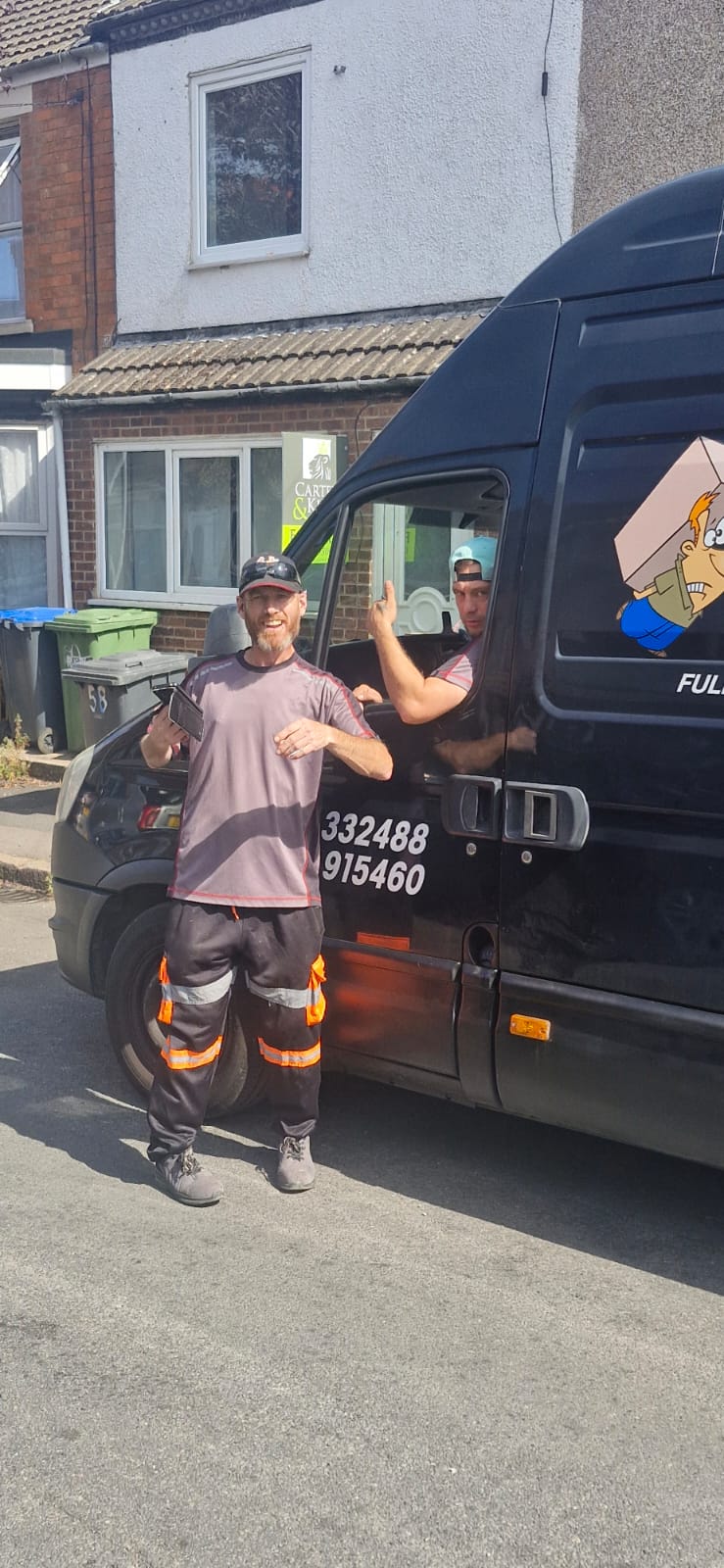 Shaw Haul crew with their van, ready for the day