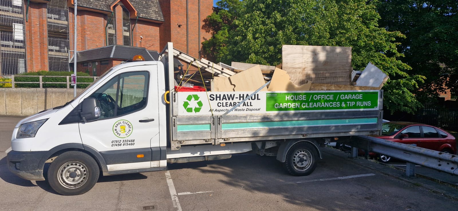 Fleet: Clearz All tipper loaded with boards and timber